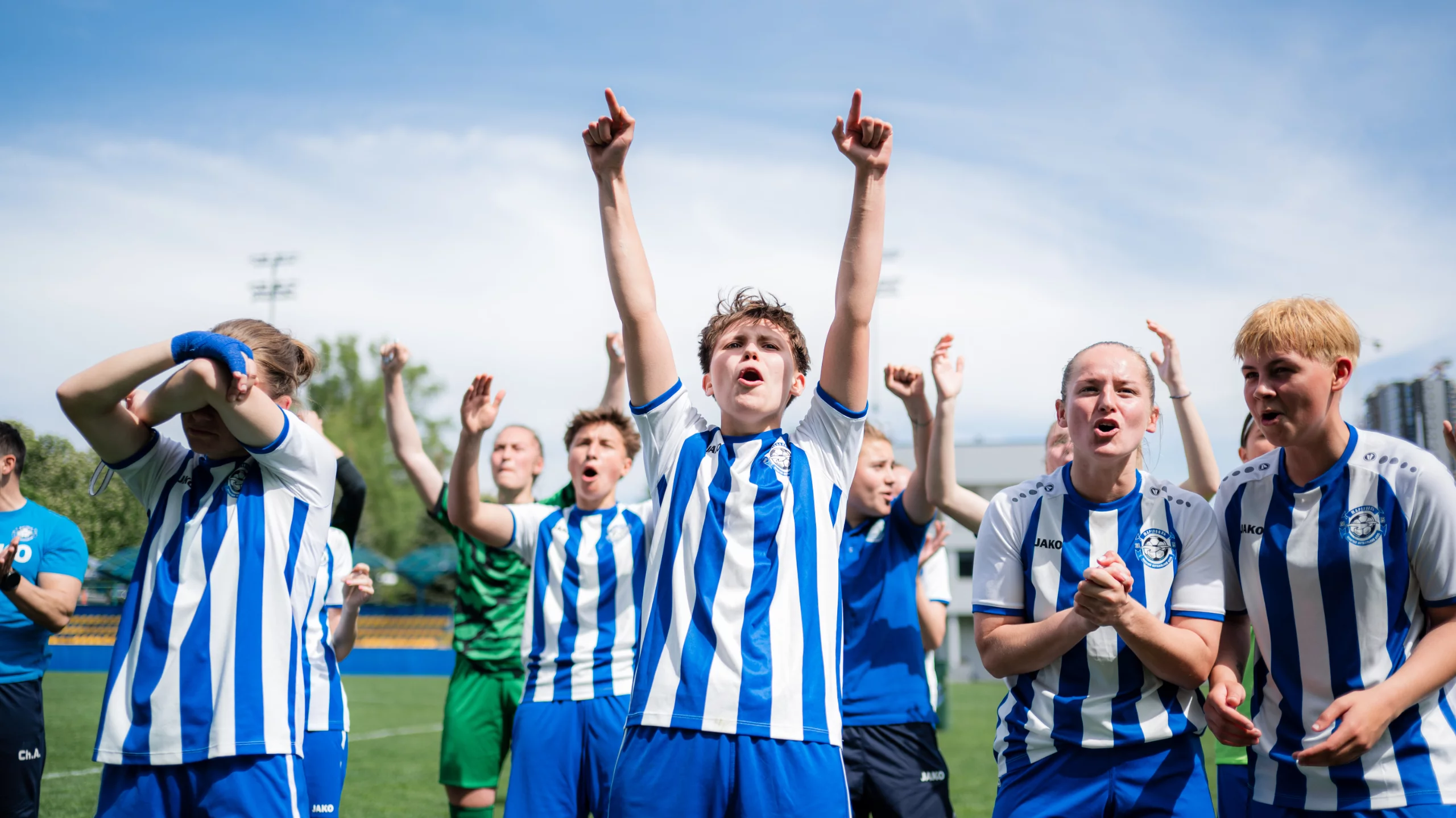 A lively social media campaign aimed at women, showcasing football fans supporting their team.